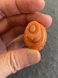 A fine Chinese red coral 'chrysanthemum' snuff bottle, 19/20th C.