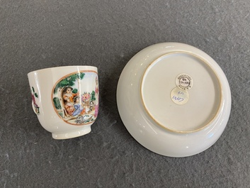 A Chinese famille rose 'European subject' cup and saucer, Qianlong
