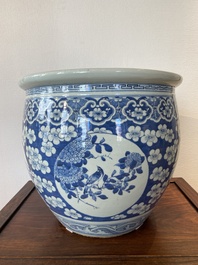 A Chinese blue and white fish bowl with medallions on a prunus-ground, 19th C.