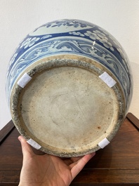 A Chinese blue and white fish bowl with medallions on a prunus-ground, 19th C.