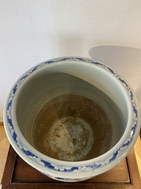 A Chinese blue and white fish bowl with medallions on a prunus-ground, 19th C.