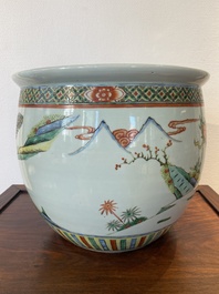 A Chinese famille verte fish bowl with warriors on horseback, 19th C.
