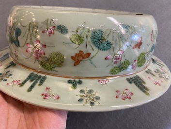 A Chinese famille rose celadon-ground 'carps' basin, 19th C.