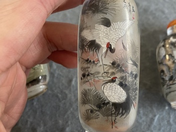 Three Chinese inside-painted glass snuff bottles, 20th C.