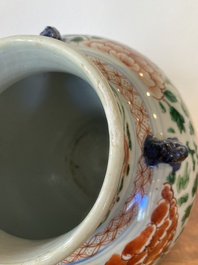 A Chinese 'peony scroll' famille verte vase and cover, Kangxi