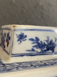 A pair of Chinese blue and white square 'narrative subject' vases and covers, Kangxi