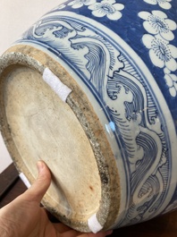 A Chinese blue and white fish bowl with medallions on a prunus-ground, 19th C.