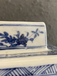 A pair of Chinese blue and white square 'narrative subject' vases and covers, Kangxi