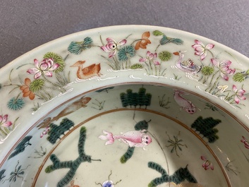 A Chinese famille rose celadon-ground 'carps' basin, 19th C.