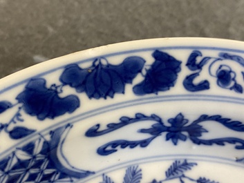 A Chinese blue and white 'two phoenixes and an immortal' plate, Kangxi/Yongzheng