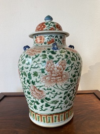 A Chinese 'peony scroll' famille verte vase and cover, Kangxi