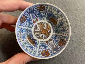 A Chinese doucai 'phoenix' saucer, Jiaqing mark, 19th C.