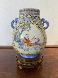 A Chinese yellow-ground famille rose 'hu' vase with playing boys, Qianlong mark, Republic