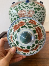 A Chinese 'peony scroll' famille verte vase and cover, Kangxi