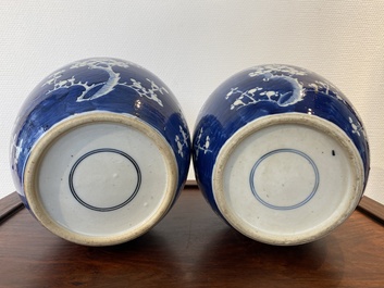 A pair of Chinese blue and white jars and covers, 19th C.