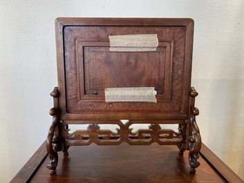 A Chinese famille verte plaque set in a partly huanghuali wooden table screen, Kangxi