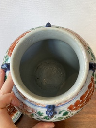 A Chinese 'peony scroll' famille verte vase and cover, Kangxi