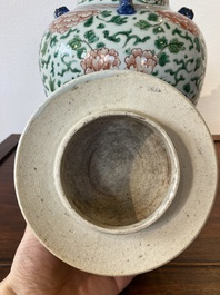 A Chinese 'peony scroll' famille verte vase and cover, Kangxi