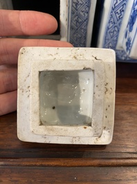 A pair of Chinese blue and white square 'narrative subject' vases and covers, Kangxi