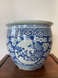 A Chinese blue and white fish bowl with medallions on a prunus-ground, 19th C.