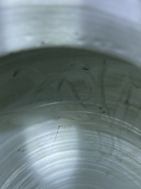 A Chinese blue, white and copper-red 'narrative subject' rouleau vase, Kangxi