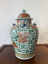 A Chinese 'peony scroll' famille verte vase and cover, Kangxi