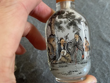 Three Chinese inside-painted glass snuff bottles, 20th C.