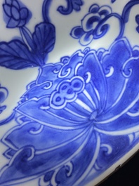 A Chinese Dutch market blue and white armorial dish with the arms of 'Pelgrom', Kangxi
