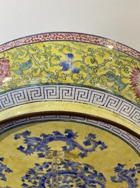 A Chinese Canton enamel dish with a lady and two boys, Yongzheng