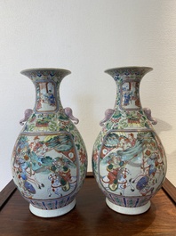 A pair of Chinese famille rose vases with elephant handles, 19th C.