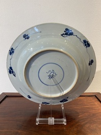 A Chinese Dutch market blue and white armorial dish with the arms of 'Pelgrom', Kangxi