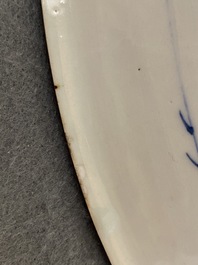 A Chinese blue and white 'peony scroll' dish and a famille verte dish, Kangxi