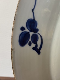 A Chinese Dutch market blue and white armorial dish with the arms of 'Pelgrom', Kangxi