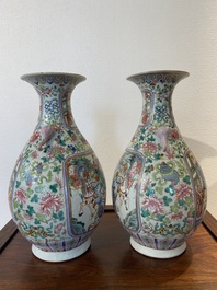 A pair of Chinese famille rose vases with elephant handles, 19th C.