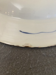 A Chinese Dutch market blue and white armorial dish with the arms of 'Pelgrom', Kangxi