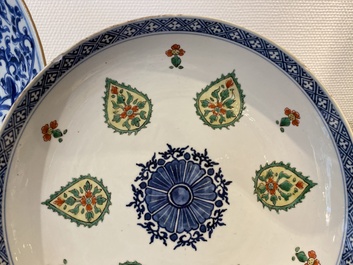 A Chinese blue and white 'peony scroll' dish and a famille verte dish, Kangxi
