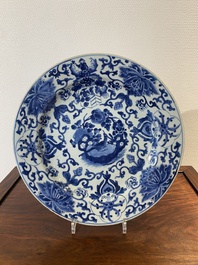 A Chinese Dutch market blue and white armorial dish with the arms of 'Pelgrom', Kangxi