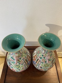A pair of Chinese famille rose vases with elephant handles, 19th C.