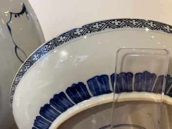 A Chinese blue and white 'peony scroll' dish and a famille verte dish, Kangxi