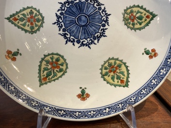 A Chinese blue and white 'peony scroll' dish and a famille verte dish, Kangxi