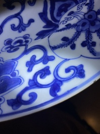 A Chinese Dutch market blue and white armorial dish with the arms of 'Pelgrom', Kangxi