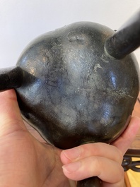 A Chinese bronze tripod censer with 'taotie' masks, Ming