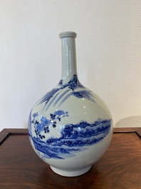 A Japanese blue and white bottle vase with a lady in a landscape, Edo, 17/18th C.