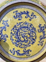 A Chinese Canton enamel dish with a lady and two boys, Yongzheng