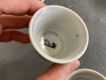 Eight Chinese mostly blue and white wine and tea cups, Ming