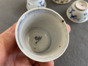 Eight Chinese mostly blue and white wine and tea cups, Ming