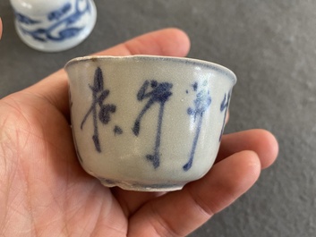 Eight Chinese mostly blue and white wine and tea cups, Ming