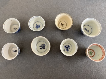Eight Chinese mostly blue and white wine and tea cups, Ming