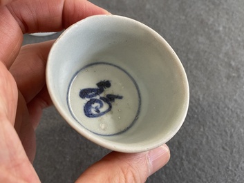 Eight Chinese mostly blue and white wine and tea cups, Ming