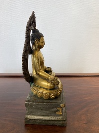 A Sino-Tibetan gilt and silvered copper alloy Medicine Buddha or Bhaishajyaguru, 19th C.